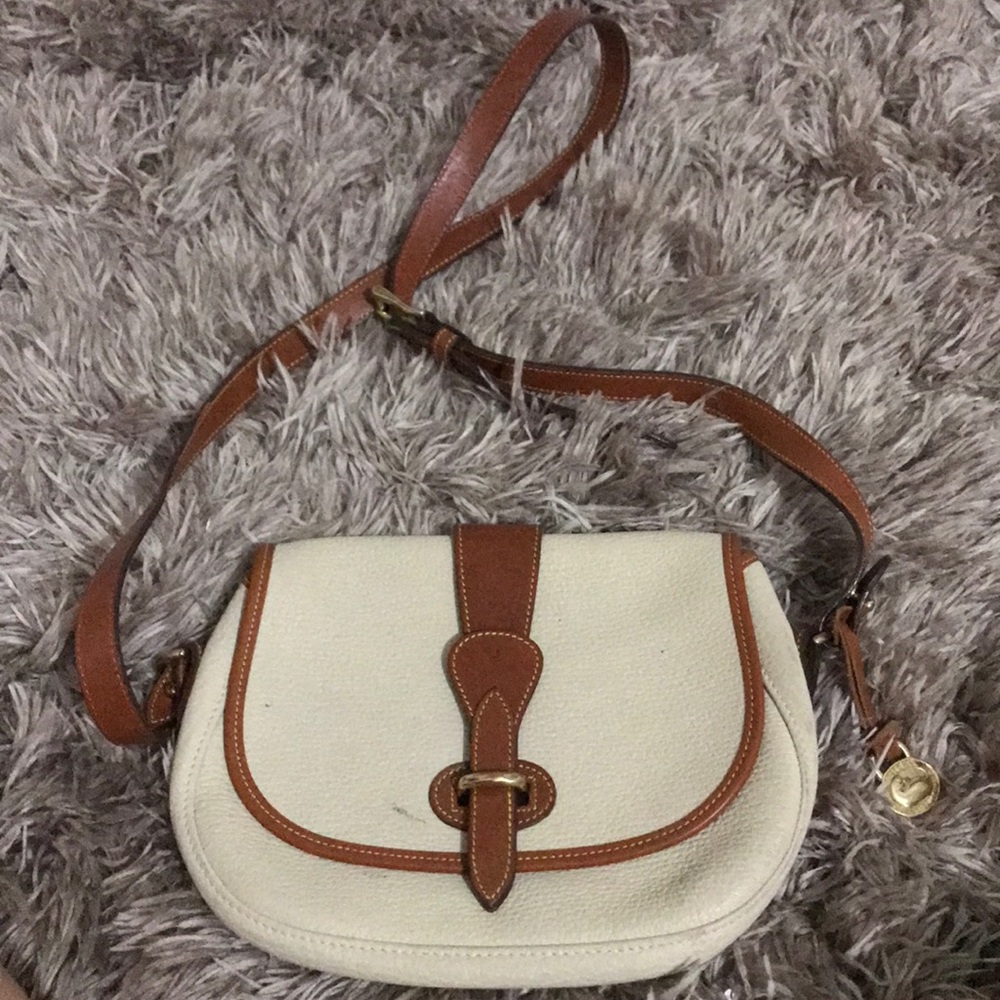 dooney and bourke | cream and tan saddle bag